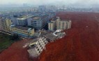 Τραγωδία στην Κίνα: Bιομηχανική λάσπη «κατάπιε» 33 κτίρια